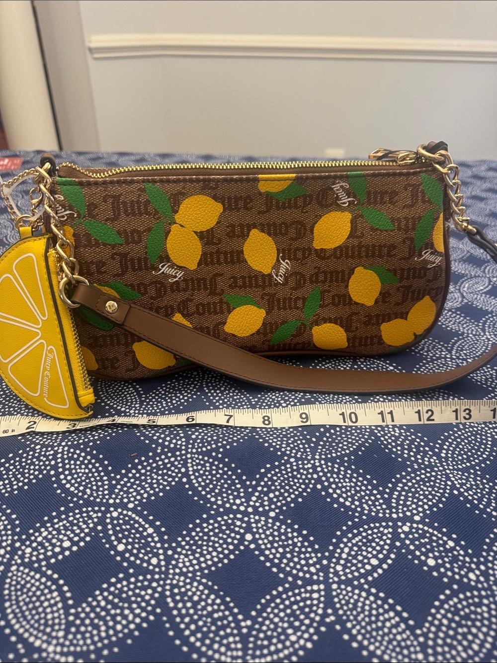 Juicy Couture Brown Lemon-Print Mini Wristlet with Yellow Charm